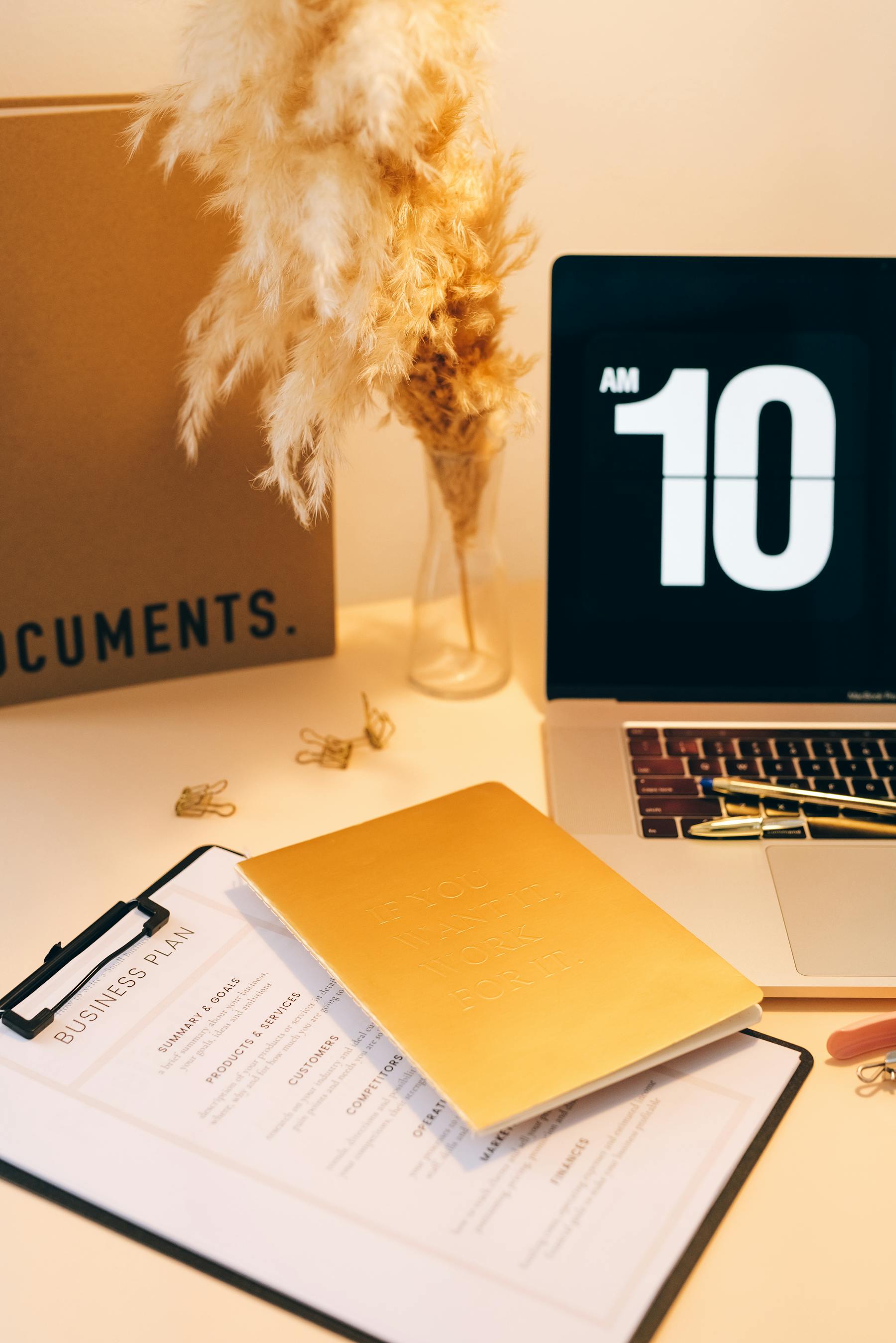 Organized planning documents and laptop for tax resources